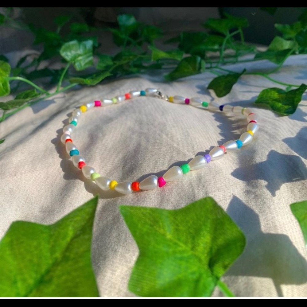 This is a pearl beaded necklace I made that’s a part of my small business!!